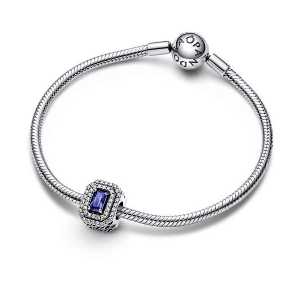 Sterling silver charm with princess blue crystal and clear cubic zirconia 