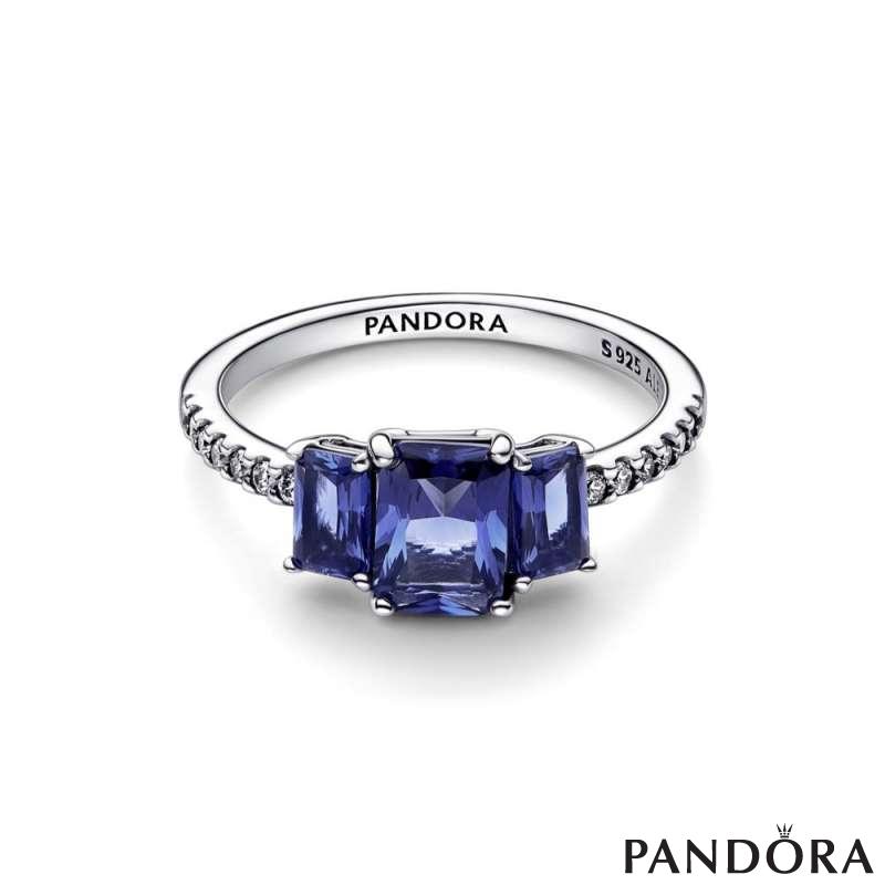 Sterling silver ring with princess blue crystal and clear cubic zirconia 