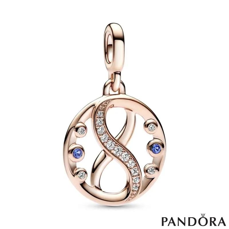 Infinity 14k rose gold-plated medallion with clear cubic zirconia and stellar blue crystal 