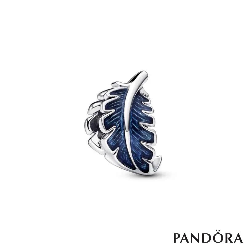 Ring with feather outlet charm